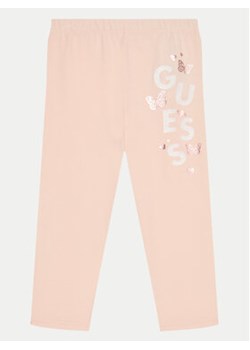 Guess Legginsy K5RB02 J1314 Koralowy Slim Fit ze sklepu MODIVO w kategorii Spodnie dziewczęce - zdjęcie 179023050