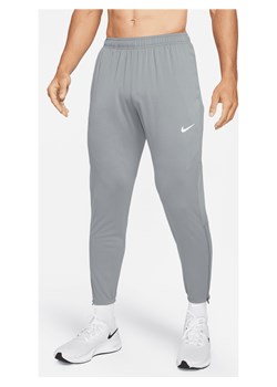 Męskie spodnie do biegania z dzianiny Nike Dri-FIT Challenger - Szary ze sklepu Nike poland w kategorii Spodnie męskie - zdjęcie 179308931