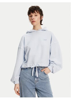 Tommy Jeans Bluza DW0DW20314 Niebieski Relaxed Fit ze sklepu MODIVO w kategorii Bluzy damskie - zdjęcie 179332692