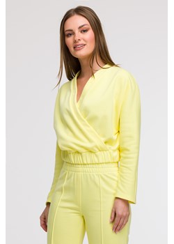 Bluza z kopertowym dekoltem - cytrynowa ze sklepu Cudmoda w kategorii Bluzy damskie - zdjęcie 179654874