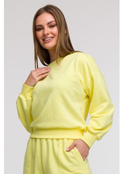 Bluza damska z otwartymi plecami - cytrynowa ze sklepu Cudmoda w kategorii Bluzy damskie - zdjęcie 179654880