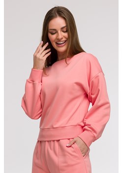 Bluza damska z otwartymi plecami - koralowa ze sklepu Cudmoda w kategorii Bluzy damskie - zdjęcie 179654881