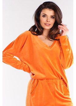 Luźna bluza welurowa z dekoltem V - pomarańczowa ze sklepu Cudmoda w kategorii Bluzy damskie - zdjęcie 179656954