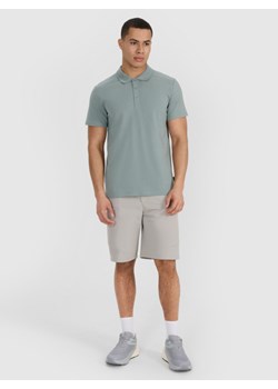 Męska koszulka polo 4F 4FRSS25TPTSM635 - zielona ze sklepu Sportstylestory.com w kategorii T-shirty męskie - zdjęcie 179791821