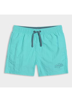 Chłopięce spodenki plażowe 4F 4FJWSS25UBDSM117 - turkusowe ze sklepu Sportstylestory.com w kategorii Kąpielówki chłopięce - zdjęcie 179792154