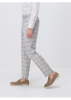 Reserved - Garniturowe spodnie slim fit - beżowy ze sklepu Reserved w kategorii Spodnie męskie - zdjęcie 180367304