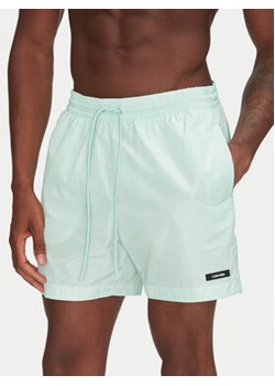 Calvin Klein Swimwear Szorty kąpielowe KM0KM01111 Zielony Regular Fit ze sklepu MODIVO w kategorii Kąpielówki - zdjęcie 180378684