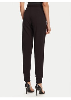 Versace Jeans Couture Spodnie dresowe 78HAAT06 Czarny Regular Fit ze sklepu MODIVO w kategorii Spodnie damskie - zdjęcie 180448554