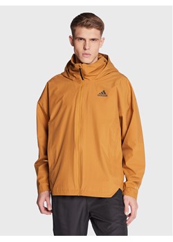 adidas Kurtka przejściowa Traveer RAIN.RDY Jacket (Gender Neutral) HG6013 Beżowy Regular Fit ze sklepu MODIVO w kategorii Kurtki męskie - zdjęcie 181032742