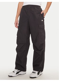 Champion Spodnie dresowe 220414 Czarny Loose Fit ze sklepu MODIVO w kategorii Spodnie męskie - zdjęcie 181032974