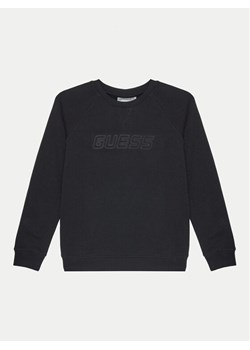 Guess Bluza L4BQ31 KAIJ1 Czarny Regular Fit ze sklepu MODIVO w kategorii Bluzy chłopięce - zdjęcie 181034930