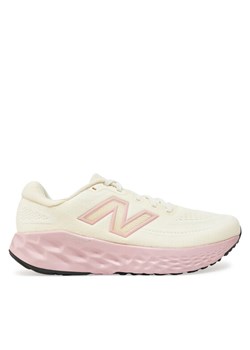 New Balance Buty do biegania Evoz WEVOZLC4 Biały ze sklepu MODIVO w kategorii Buty sportowe damskie - zdjęcie 181035094