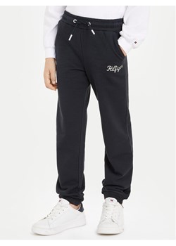 Tommy Hilfiger Spodnie dresowe NY KG0KG08108 Granatowy Regular Fit ze sklepu MODIVO w kategorii Spodnie chłopięce - zdjęcie 181035710