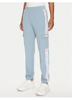 EA7 Emporio Armani Spodnie dresowe 3DTP64 TJKWZ 1533 Błękitny Regular Fit ze sklepu MODIVO w kategorii Spodnie damskie - zdjęcie 181035853