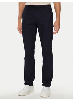 Tommy Hilfiger Chinosy Denton MW0MW33915 Granatowy Straight Fit ze sklepu MODIVO w kategorii Spodnie męskie - zdjęcie 181035960