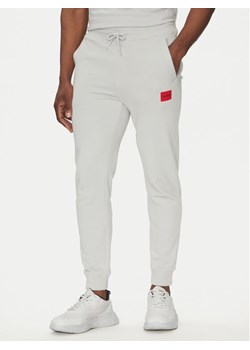 HUGO Spodnie dresowe Doak212 50447963 Szary Regular Fit - id: 0000305104618 - marki Hugo Boss - 181036070 HUGO Spodnie dresowe Doak212 50447963 Szary Regular Fit ze sklepu MODIVO w kategorii Spodnie męskie - zdjęcie 181036070
