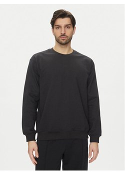 adidas Bluza Premium Essentials JC9574 Czarny Loose Fit ze sklepu MODIVO w kategorii Bluzy męskie - zdjęcie 181036654