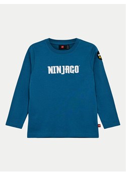 LEGO Bluzka Ninjago 12011275 Niebieski Regular Fit ze sklepu MODIVO w kategorii T-shirty chłopięce - zdjęcie 181037632