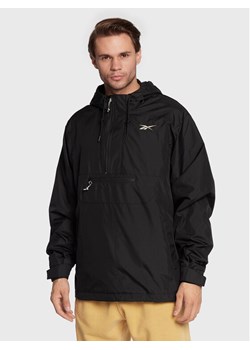 Reebok Kurtka anorak Vector HG8932 Czarny Relaxed Fit ze sklepu MODIVO w kategorii Kurtki męskie - zdjęcie 181038551