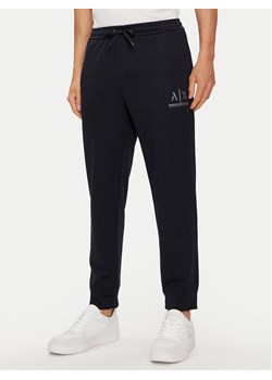 Armani Exchange Spodnie dresowe 3DZPSA Z9N1Z 1583 Granatowy Regular Fit ze sklepu MODIVO w kategorii Spodnie męskie - zdjęcie 181038871