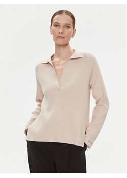 Calvin Klein Sweter Essential K20K206019 Beżowy Relaxed Fit ze sklepu MODIVO w kategorii Swetry damskie - zdjęcie 181038893