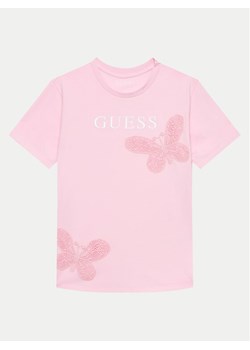 Guess T-Shirt J4GI20 K8HM4 Różowy Regular Fit ze sklepu MODIVO w kategorii Bluzki dziewczęce - zdjęcie 181039083