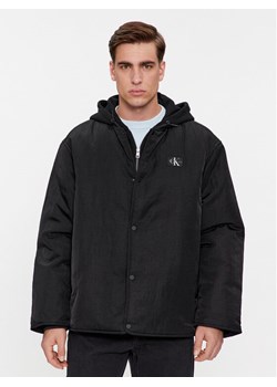 Calvin Klein Jeans Kurtka przejściowa Skater Hooded Jacket J30J325290 Czarny Regular Fit ze sklepu MODIVO w kategorii Kurtki męskie - zdjęcie 181039440