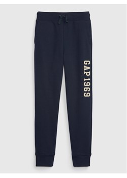 Gap Spodnie dresowe 735709-00 Granatowy Regular Fit ze sklepu MODIVO w kategorii Spodnie chłopięce - zdjęcie 181039863