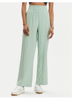Vero Moda Spodnie materiałowe Carmen 10278926 Zielony Wide Leg ze sklepu MODIVO w kategorii Spodnie damskie - zdjęcie 181041202