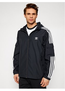 adidas Wiatrówka adicolor Classics 3-Stripes GN3475 Czarny Regular Fit ze sklepu MODIVO w kategorii Kurtki męskie - zdjęcie 181042022