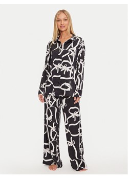 Guess Piżama O4BX16 WEFC2 Czarny Relaxed Fit ze sklepu MODIVO w kategorii Piżamy damskie - zdjęcie 181043911