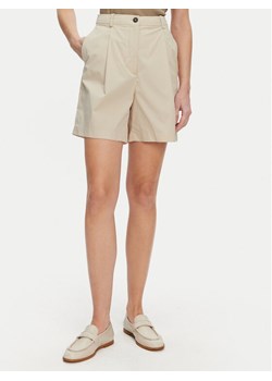 Tommy Hilfiger Bermudy WW0WW44764 Beżowy Relaxed Fit ze sklepu MODIVO w kategorii Szorty - zdjęcie 181044502