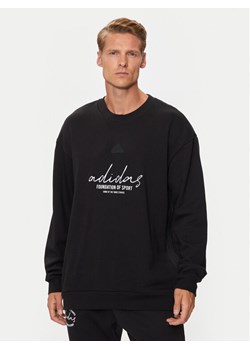 adidas Bluza Brand Love IW3542 Czarny Loose Fit ze sklepu MODIVO w kategorii Bluzy męskie - zdjęcie 181045400