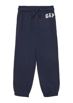Gap Spodnie dresowe 743964-04 Granatowy Regular Fit ze sklepu MODIVO w kategorii Spodnie chłopięce - zdjęcie 181045743