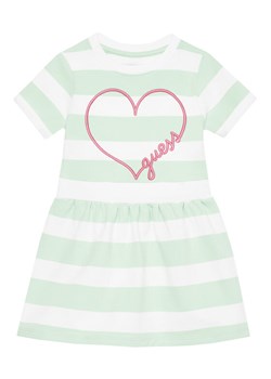 Guess Sukienka codzienna K5GK28 KBOR4 Zielony Regular Fit ze sklepu MODIVO w kategorii Sukienki dziewczęce - zdjęcie 181046553