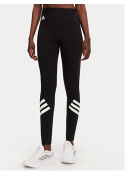 adidas Legginsy Future Icons 3-Stripes JE0215 Czarny Slim Fit ze sklepu MODIVO w kategorii Spodnie damskie - zdjęcie 181046633