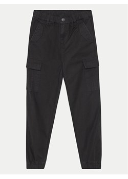 Guess Spodnie materiałowe L4YB00 WGBT0 Czarny Regular Fit ze sklepu MODIVO w kategorii Spodnie dziewczęce - zdjęcie 181051592