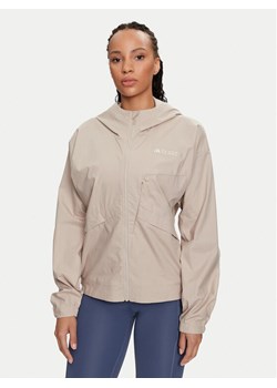 adidas Wiatrówka Terrex Xploric IK9114 Beżowy Loose Fit ze sklepu MODIVO w kategorii Kurtki damskie - zdjęcie 181051872