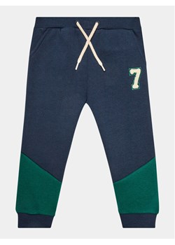 NAME IT Spodnie dresowe 13220047 Granatowy Regular Fit ze sklepu MODIVO w kategorii Spodnie chłopięce - zdjęcie 181052034