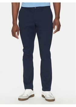 Michael Kors Chinosy CS4301KDR2 Granatowy Slim Fit ze sklepu MODIVO w kategorii Spodnie męskie - zdjęcie 181052262