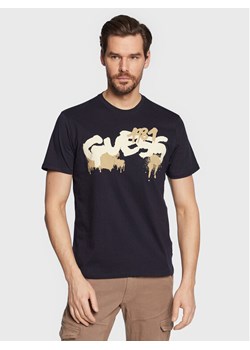 Guess T-Shirt Graffiti Logo M3GI59 K9RM1 Granatowy Slim Fit ze sklepu MODIVO w kategorii T-shirty męskie - zdjęcie 181052850