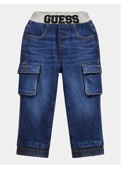 Guess Jeansy Cargo N4RA01 D4GV0 Granatowy Relaxed Fit ze sklepu MODIVO w kategorii Spodnie chłopięce - zdjęcie 181053281