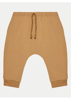 United Colors Of Benetton Spodnie dresowe 35Q2AF023 Brązowy Regular Fit ze sklepu MODIVO w kategorii Spodnie i półśpiochy - zdjęcie 181055102