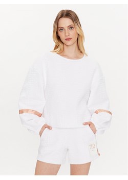 EA7 Emporio Armani Bluza 3RTM40 TJLRZ 1100 Biały Relaxed Fit ze sklepu MODIVO w kategorii Bluzy damskie - zdjęcie 181056503