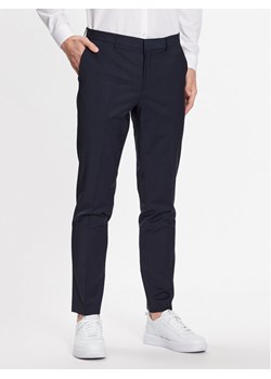 Hugo Spodnie garniturowe 50446526 Granatowy Slim Fit ze sklepu MODIVO w kategorii Spodnie męskie - zdjęcie 181058962