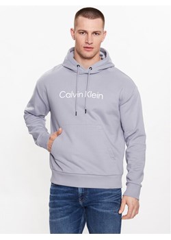 Calvin Klein Bluza Hero K10K111345 Szary Regular Fit ze sklepu MODIVO w kategorii Bluzy męskie - zdjęcie 181059101