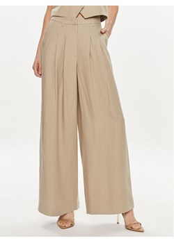 Herskind Spodnie materiałowe Lotus 5114840 Beżowy Relaxed Fit ze sklepu MODIVO w kategorii Spodnie damskie - zdjęcie 181059323