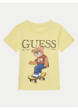 Guess T-Shirt N5GI04 K8HM4 Żółty Regular Fit ze sklepu MODIVO w kategorii T-shirty chłopięce - zdjęcie 181062251