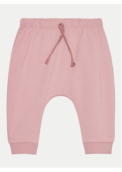 United Colors Of Benetton Spodnie dresowe 35Q2AF023 Różowy Regular Fit ze sklepu MODIVO w kategorii Spodnie i półśpiochy - zdjęcie 181063472