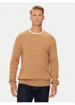 Tommy Hilfiger Sweter MW0MW33132 Beżowy Regular Fit ze sklepu MODIVO w kategorii Swetry męskie - zdjęcie 181065860